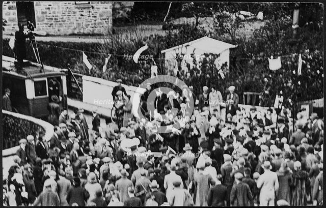 Crowd of people on Flora Day for the Helston Furry Dance, Helston, Cornwall, 1925-1935. Creator: George R Long.