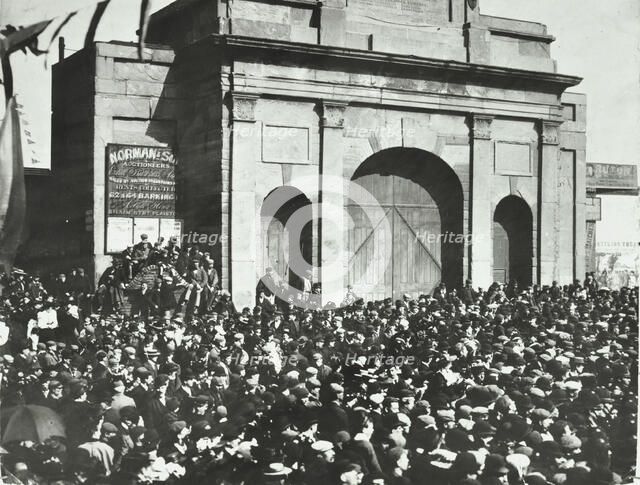 Crowd outside the closed East India Dock Gates, Poplar, London, 1897. Artist: Unknown.