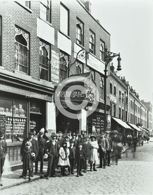 Crowd outside the Russian Vapour Baths, Brick Lane, Stepney, London, 1904. Artist: Unknown.