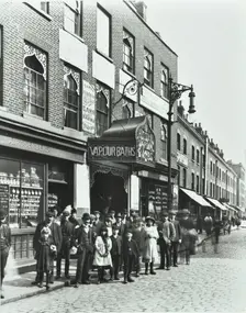 Crowd outside the Russian Vapour Baths, Brick Lane, Stepney, London, 1904