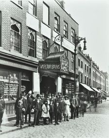 Crowd outside the Russian Vapour Baths, Brick Lane, Stepney, London, 1904