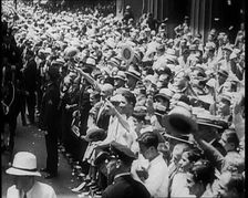 Crowd Watching a Procession, 1933. Creator: British Pathe Ltd