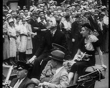 Crowd Watching Jim and Amy Mollison Sitting in a Car , 1933. Creator: British Pathe Ltd