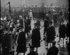 Crowd Watching the Funeral Procession of George V, His Majesty The King, 1936. Creator: British Pathe Ltd