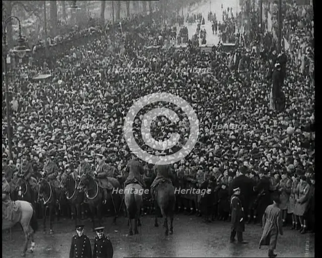 Crowd Watching the Funeral Procession of George V, His Majesty The King, 1936. Creator: British Pathe Ltd.
