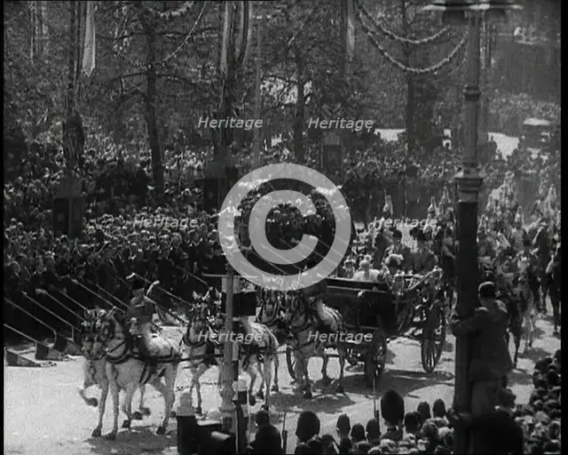Crowd Watching the Silver Jubilee Parade of George V, His Majesty The King, 1936. Creator: British Pathe Ltd.