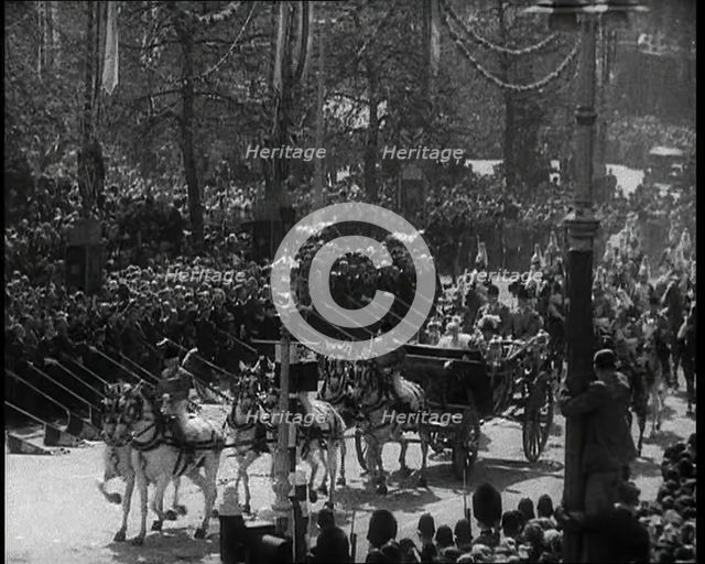 Crowd Watching the Silver Jubilee Parade of George V, His Majesty The King, 1936. Creator: British Pathe Ltd.