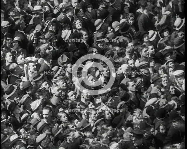 Crowd Watching the Silver Jubilee Parade of George V, His Majesty The King, 1936. Creator: British Pathe Ltd.