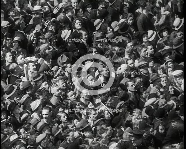 Crowd Watching the Silver Jubilee Parade of George V, His Majesty The King, 1936. Creator: British Pathe Ltd.