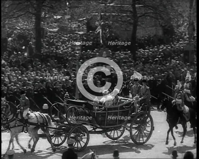 Crowd Watching the Silver Jubilee Parade of George V, His Majesty The King, 1936. Creator: British Pathe Ltd.