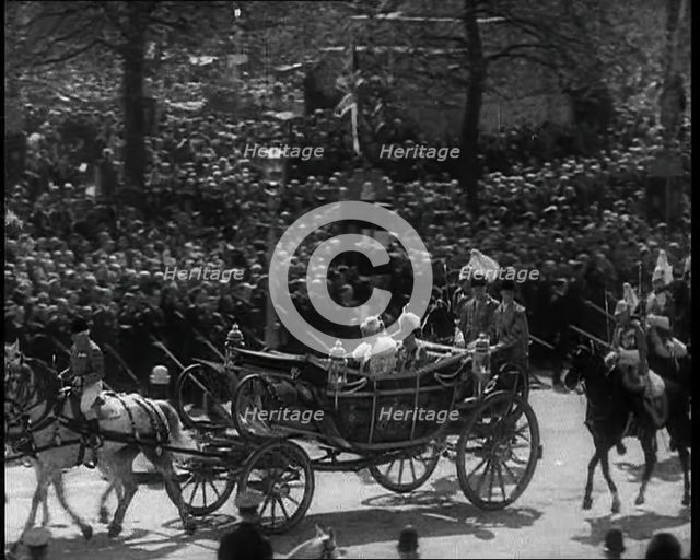 Crowd Watching the Silver Jubilee Parade of George V, His Majesty The King, 1936. Creator: British Pathe Ltd.