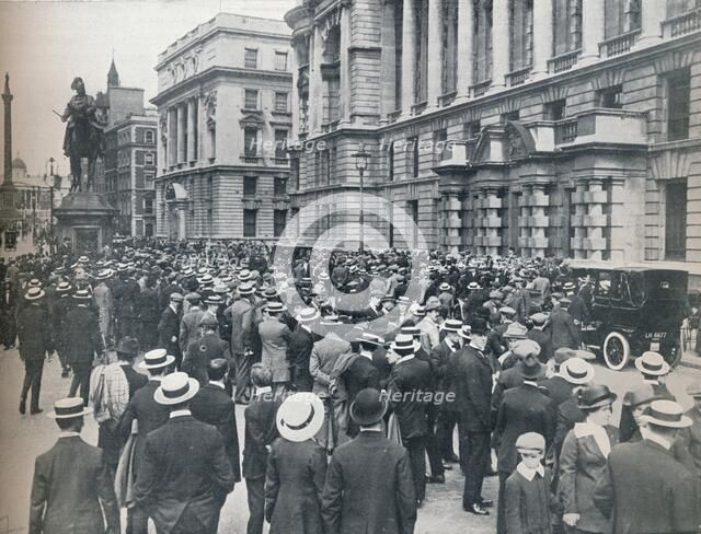 Crowd waiting outside the War Office on the morning before war was declared', 1914. Artist: Unknown