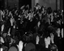 Crowd With Right Arms Raised in a Nazi Salute in the Direction of the..., 1937. Creator: British Pathe Ltd