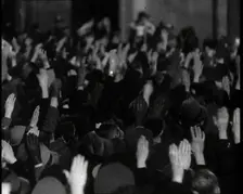Crowd With Right Arms Raised in a Nazi Salute in the Direction of the..., 1937. Creator: British Pathe Ltd