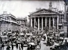 Crowded street scene in front of the Royal Exchange, London, c1900