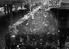 Crowded street, possibly near a subway station, between c1910 and c1915. Creator: Bain News Service