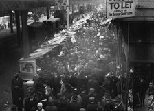 Crowded street, possibly near a subway station, between c1910 and c1915. Creator: Bain News Service
