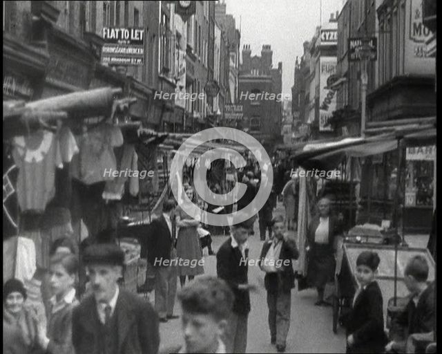 Crowds Milling Around Berwick Street Market, 1930s. Creator: British Pathe Ltd.