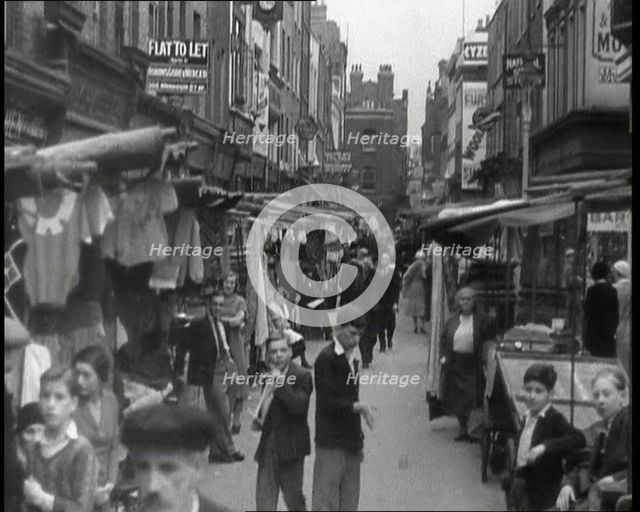 Crowds Milling Around Berwick Street Market, 1930s. Creator: British Pathe Ltd.