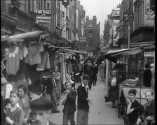 Crowds Milling Around Berwick Street Market, 1930s. Creator: British Pathe Ltd