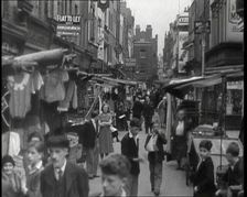 Crowds Milling Around Berwick Street Market, 1930s. Creator: British Pathe Ltd