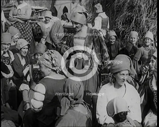 Crowds of Female Actors Wearing Period Costumes Drinking Beer Whilst Filming the German..., 1920s. Creator: British Pathe Ltd.