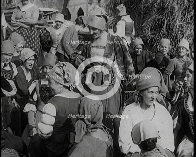 Crowds of Female Actors Wearing Period Costumes Drinking Beer Whilst Filming the German..., 1920s. Creator: British Pathe Ltd.