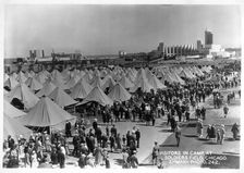 Crowds of people visiting a military encampment at Soldiers Field, Chicago, Illinois, USA, 1930