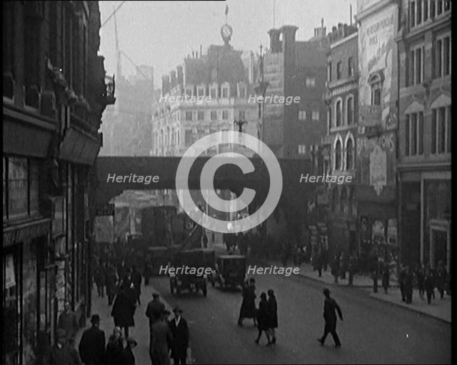 Crowds of People Walking the Streets of London, 1929. Creator: British Pathe Ltd.