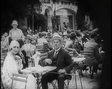 Crowds of People Enjoying Themselves at an Outside Café, 1926. Creator: British Pathe Ltd