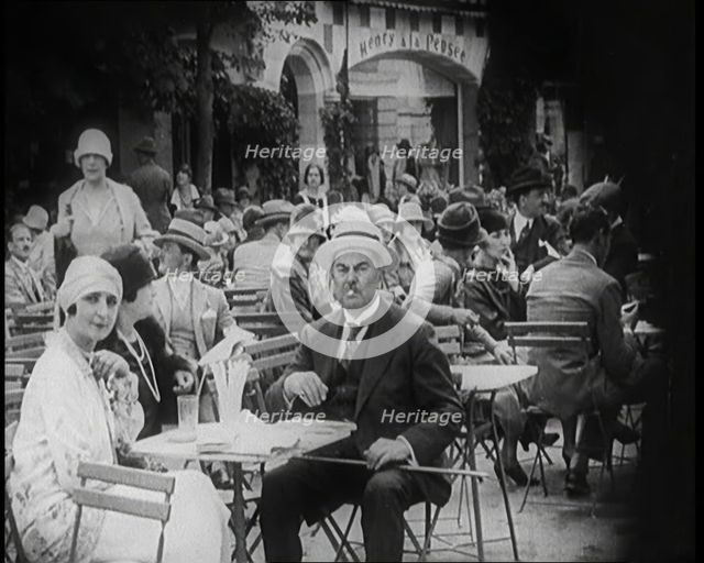 Crowds of People Enjoying Themselves at an Outside Café, 1926. Creator: British Pathe Ltd.