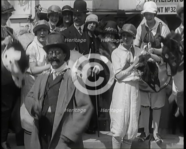 Crowds of People Having Fun in Fancy Dress at a Garden Fete, 1926. Creator: British Pathe Ltd.