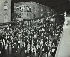 Crowds of shoppers in Rye Lane at night, Peckham, London, 1913