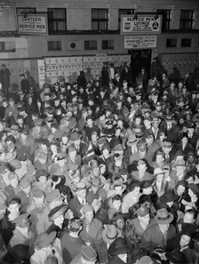 Crowds of soldiers, sailors, and civilians waiting to board trains at..., Washington, D.C., 1942. Creator: Gordon Parks