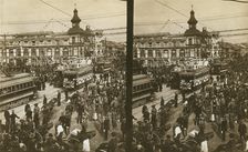 Crowds on a Tokyo street, near the train station(?), during the celebration of Admiral..., c1905. Creator: Underwood & Underwood