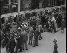 Crowds at a Motor Race in Ireland, 1936. Creator: British Pathe Ltd