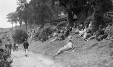 Crowds attending a motor race at Brooklands. Artist: Bill Brunell