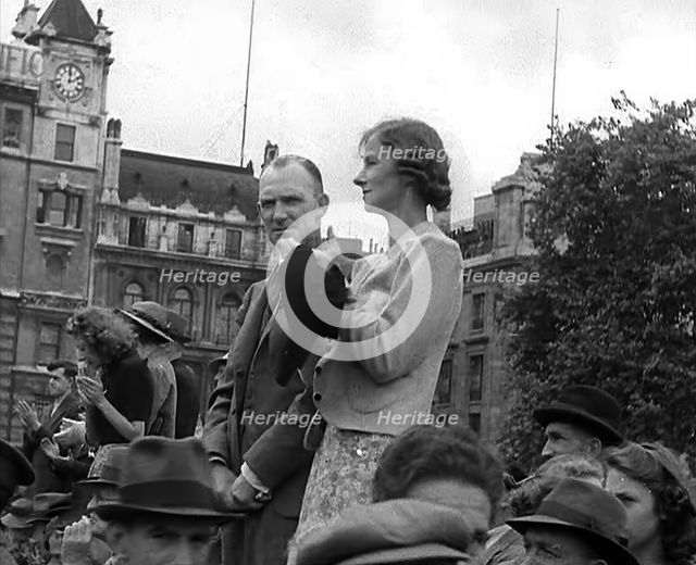 Crowds Applauding a Military Band at Trafalgar Square, 1940. Creator: British Pathe Ltd.