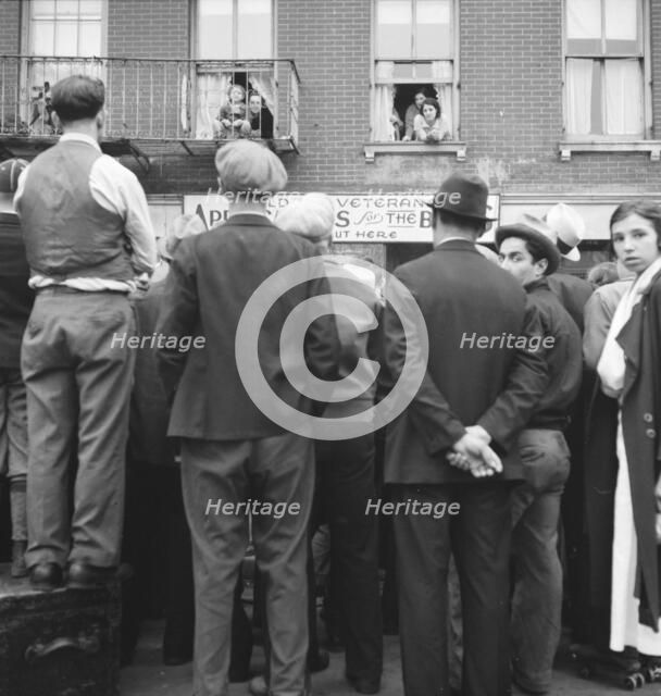 Crowds around post office, Lower East Side, New York, 1936. Creator: Dorothea Lange.