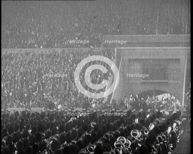 Crowds Cheer as King George V and Queen Mary of The United Kingdom Enter of the Wembley..., 1924. Creator: British Pathe Ltd.
