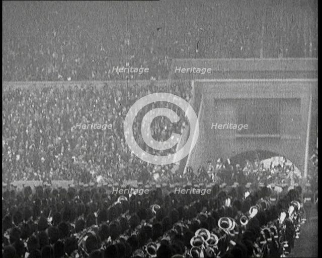 Crowds Cheer as King George V and Queen Mary of The United Kingdom Enter of the Wembley..., 1924. Creator: British Pathe Ltd.