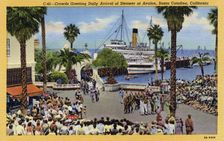 Crowds greet the daily arrival of a steamer, Avalon, Santa Catalina Island, California, USA, 1940