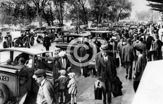 Crowds in front of the station, Orsay, Paris, 1931. Artist: Ernest Flammarion