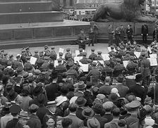 Crowds Listening to a Brass Band in Trafalgar Square, 1940. Creator: British Pathe Ltd