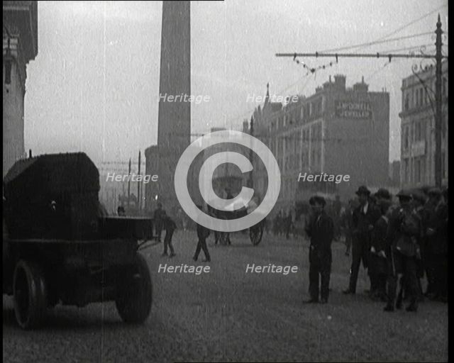Crowds Parting and Being Held Back by Soldiers for Armoured Cars to Pass Through the Streets...,1920 Creator: British Pathe Ltd.