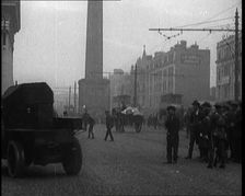 Crowds Parting and Being Held Back by Soldiers for Armoured Cars to Pass Through the Streets...,1920 Creator: British Pathe Ltd