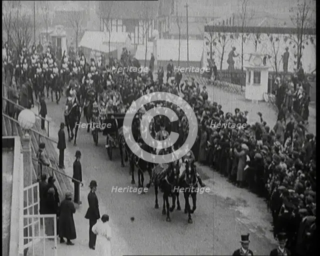 Crowds Stand by and Cheer as King George V and Queen Mary of The United Kingdom Ride in a..., 1924. Creator: British Pathe Ltd.