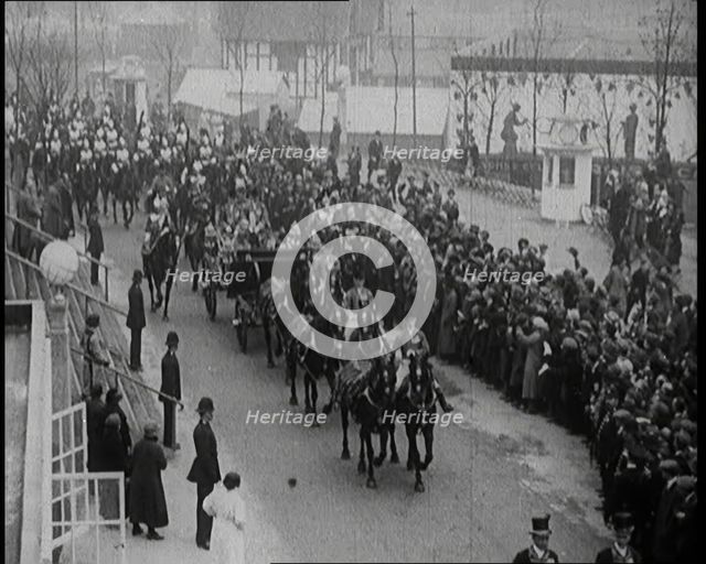Crowds Stand by and Cheer as King George V and Queen Mary of The United Kingdom Ride in a..., 1924. Creator: British Pathe Ltd.