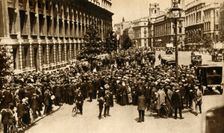 Crowds waiting outside Downing Street in London for news about...war, July 1914, (1933). Creator: Unknown