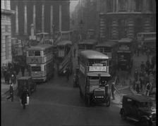 Crowds Walking Around the Streets of London, 1936. Creator: British Pathe Ltd